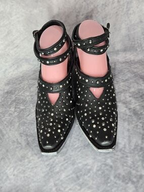 Lane Boots "Sparks Fly" Ankle Strap Clogs in Jet Black Leather.